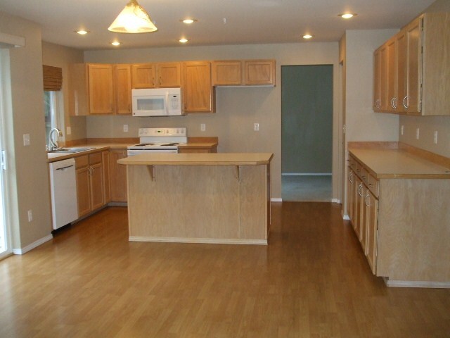 Property Photo: 10409 Springwood Dr E WA 98391