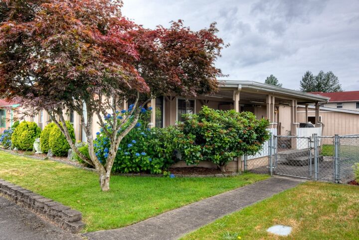 Property Photo:  9810 Alaska St S  WA 98444 