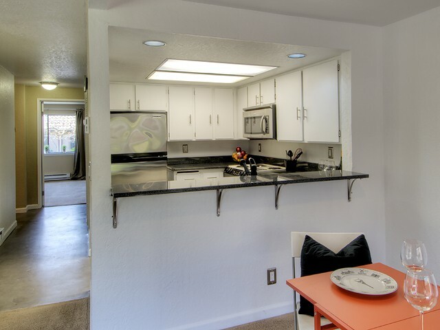 Property Photo:  709 143rd NE 25  WA 98007 