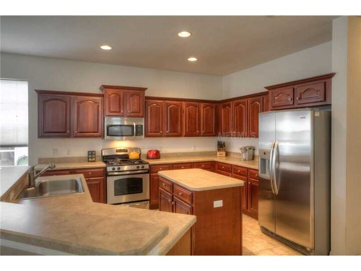 Property Photo:  9210 Oak Pride Court  FL 33647 
