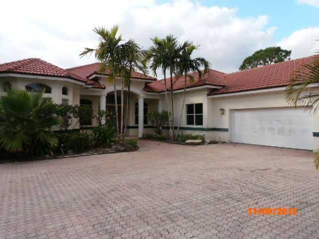 Property Photo:  8247 Steeplechase Drive  FL 33418 