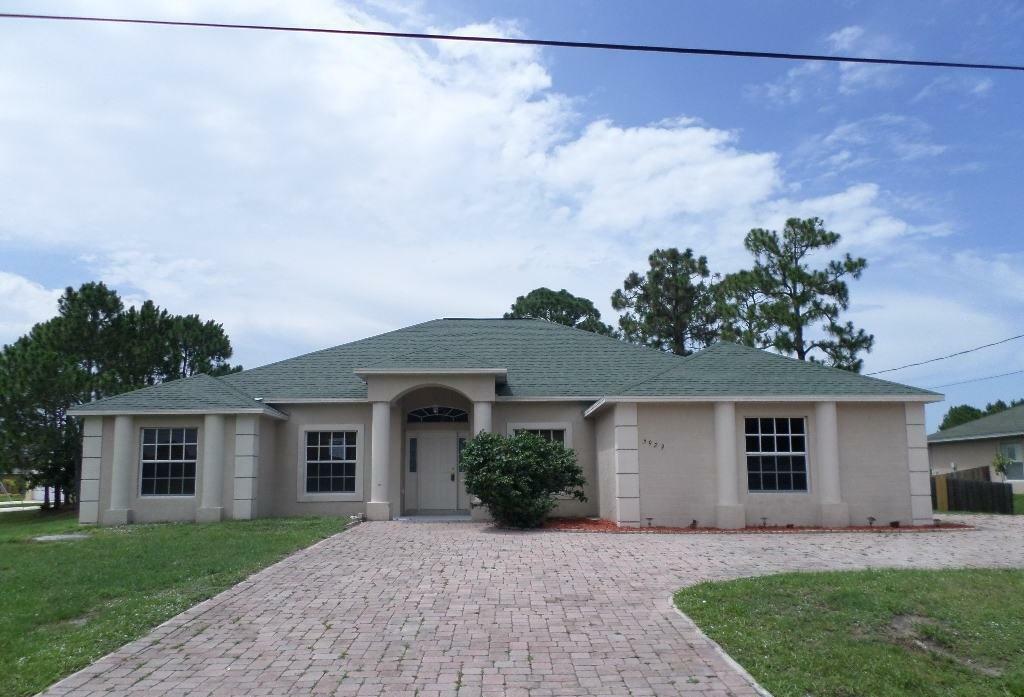 Property Photo:  5929 NW Conus Street  FL 34986 