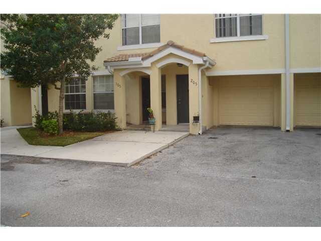 Property Photo:  124 SW Peacock 13-205  FL 34986 