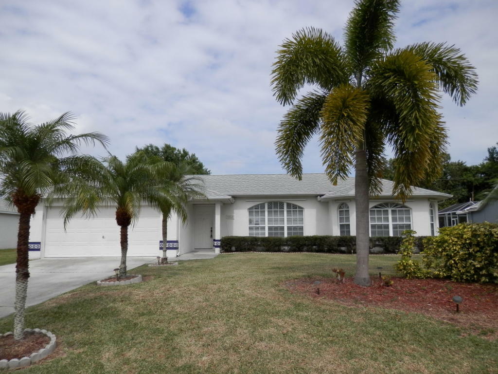 Property Photo:  6461 NW Friendly Circle  FL 34983 