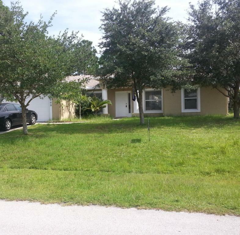 Property Photo:  2009 SW Fears Av Avenue  FL 34953 