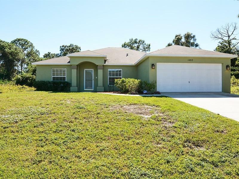 Property Photo:  1482 SW Malaga Av  FL 34953 