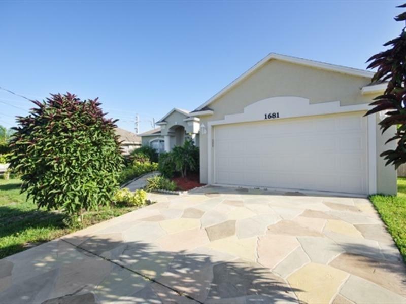 Property Photo:  1681 SW Aledo Lane  FL 34953 