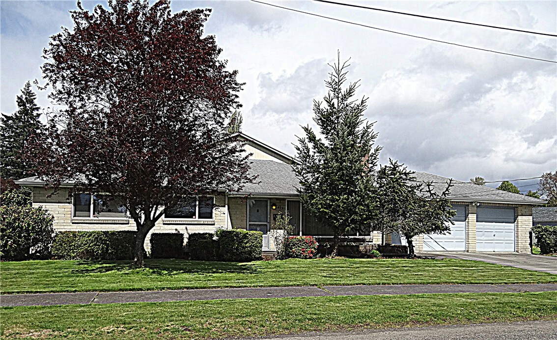 Property Photo:  415 S 94th St  WA 98444 