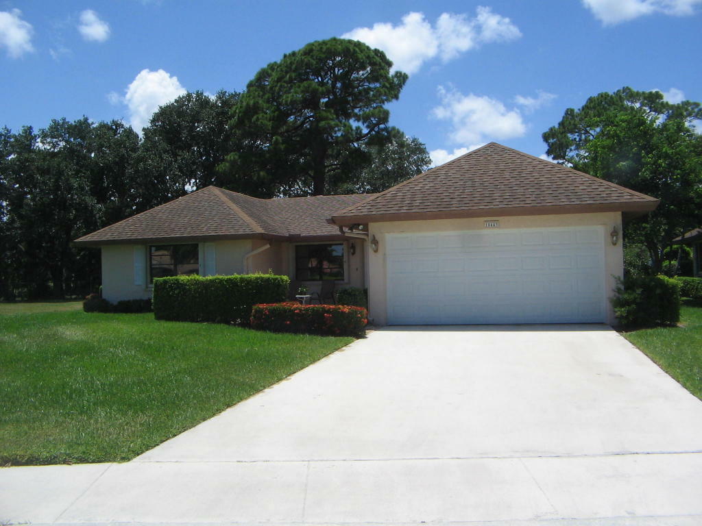 Property Photo:  10443 Greentrail Drive N  FL 33436 