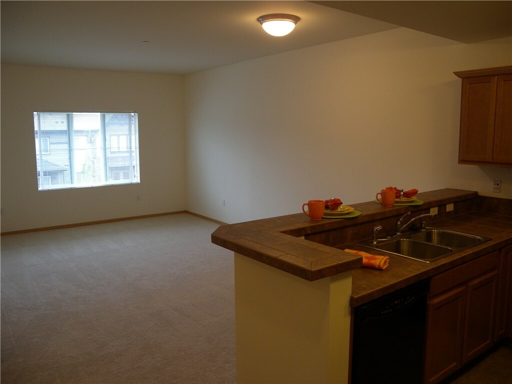 Property Photo:  973 NE Ingram St A310  WA 98029 