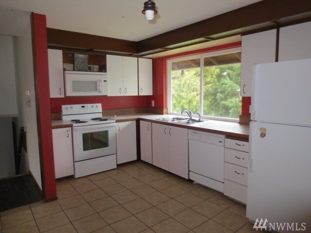 Property Photo: 8101 79th St SW WA 98498