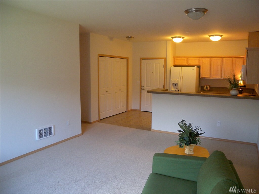 Property Photo:  973 NE Ingram St A203  WA 98029 