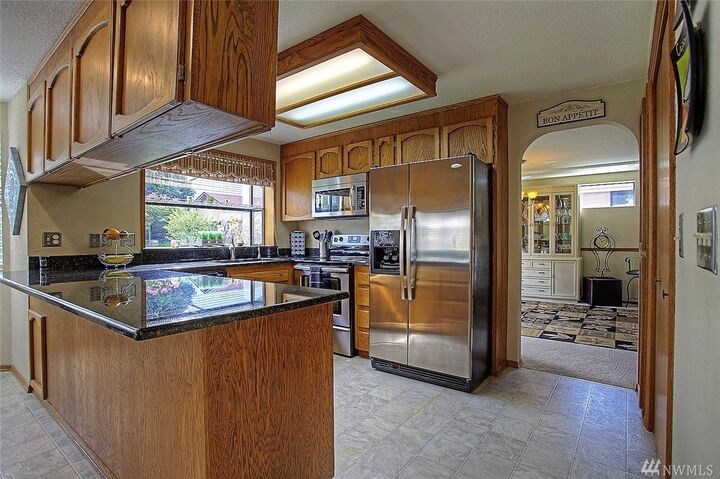 Property Photo:  1825 N Villard St  WA 98406 