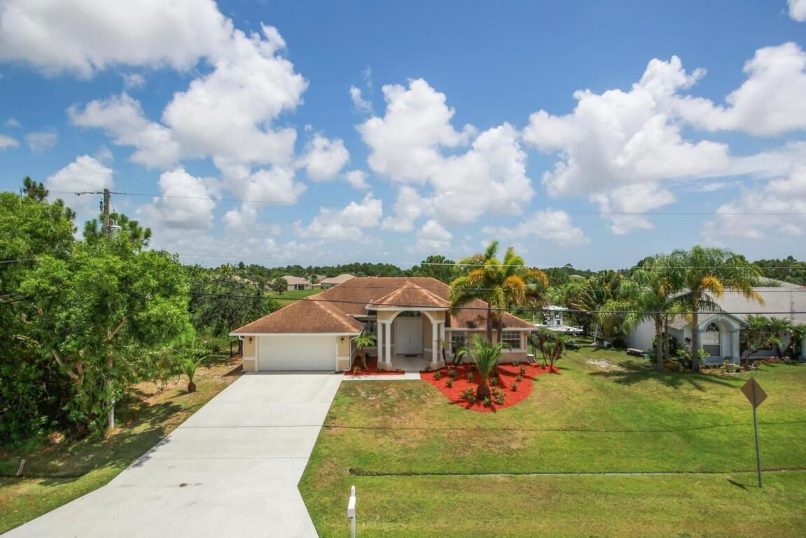 Property Photo:  6043 NW Winfield Drive 34983  FL 34953 