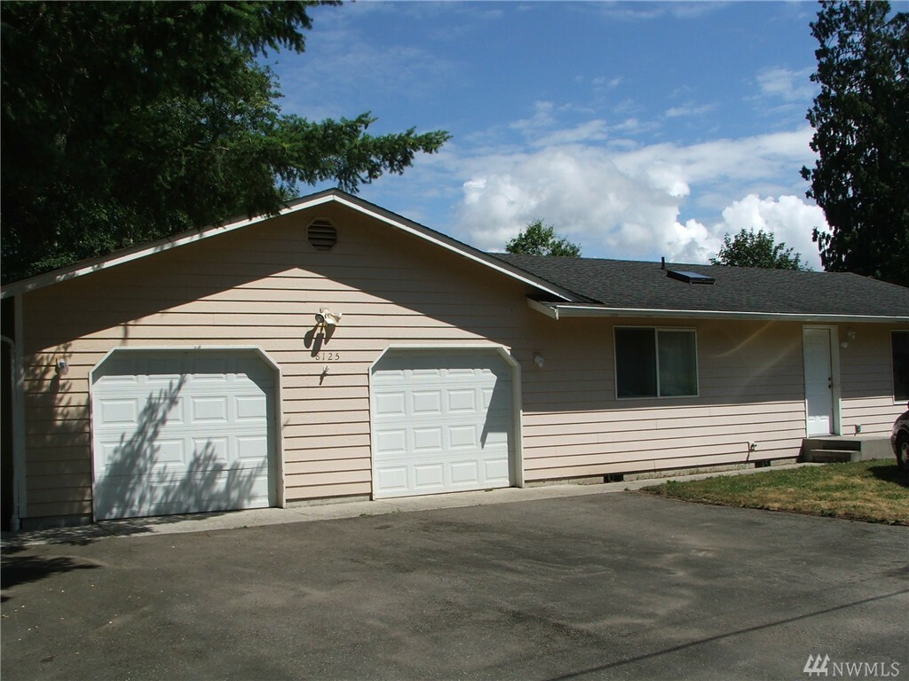 Property Photo:  8125 325th Place NW Aampampb  WA 98292 