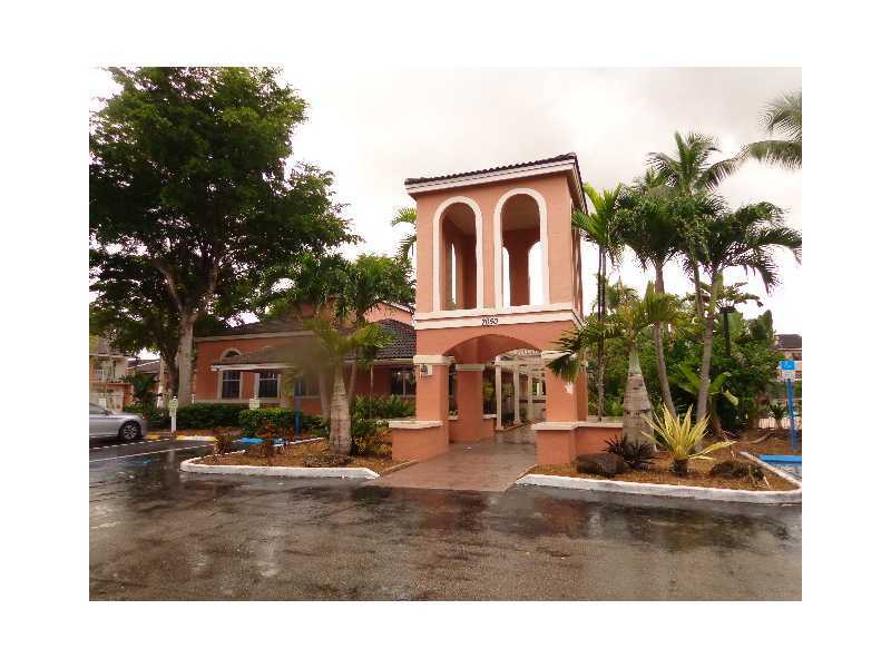 Property Photo: 7120 NW 179 St 204 FL 33015