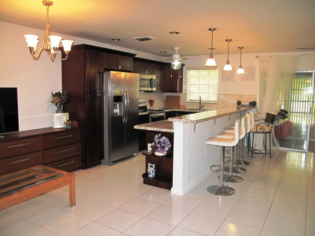 Property Photo:  325 NW 50th Avenue B  FL 33445 