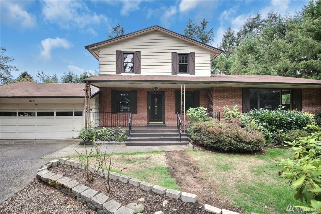 Property Photo:  11710 Farwest Dr SW  WA 98498 