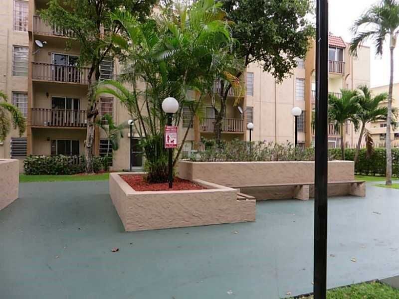 Property Photo:  4855 NW 7th St 201-6  FL 33126 
