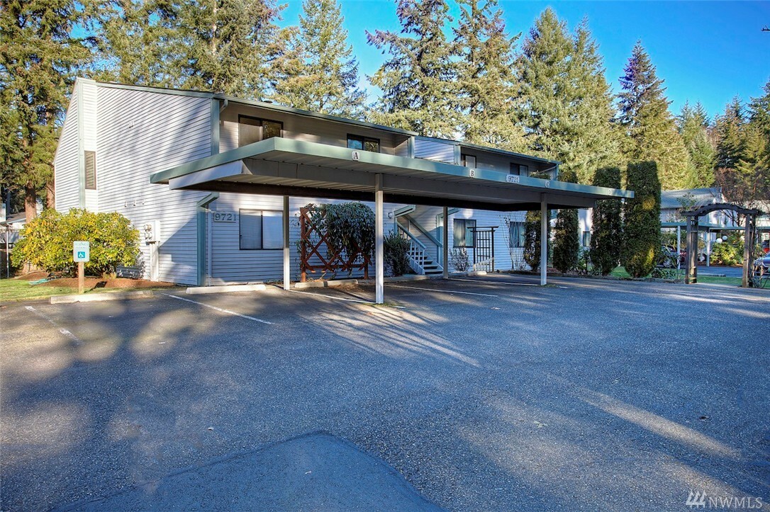 Property Photo:  9721 Bristonwood Dr W 11-C  WA 98467 