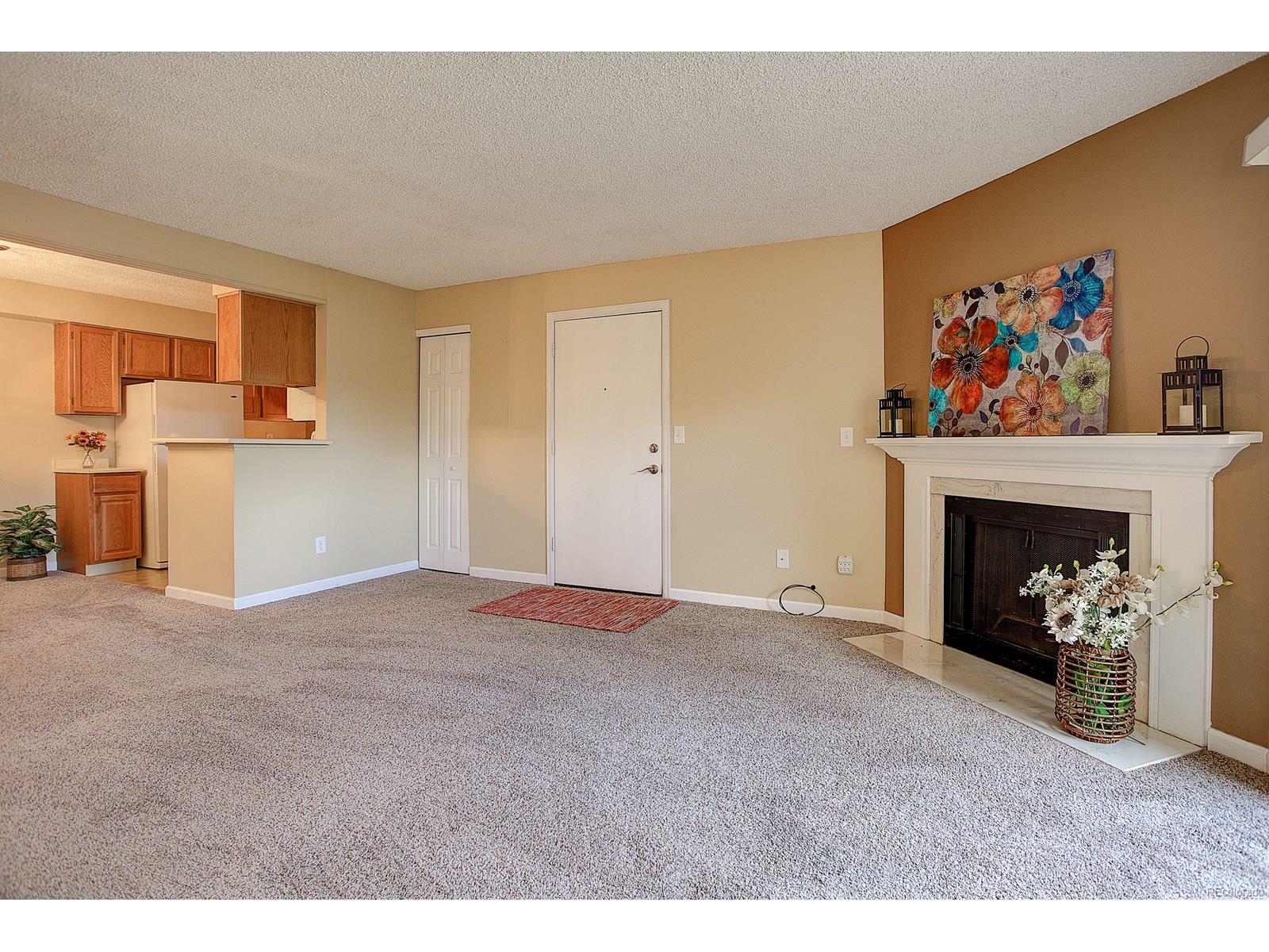 Property Photo: 3324 South Ammons Street Unit 103 CO 80227
