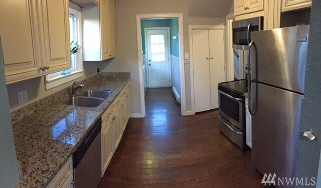 Property Photo: 5037 S Sheridan Ave WA 98408