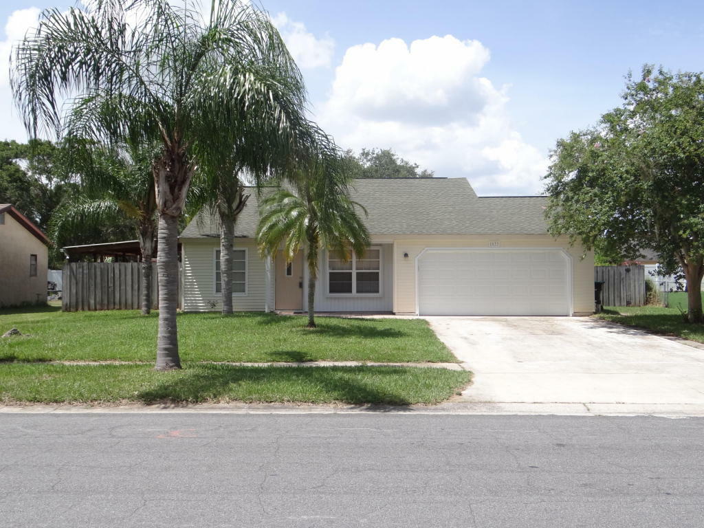 Property Photo:  1633 NE Norwood Street NE  FL 32905 