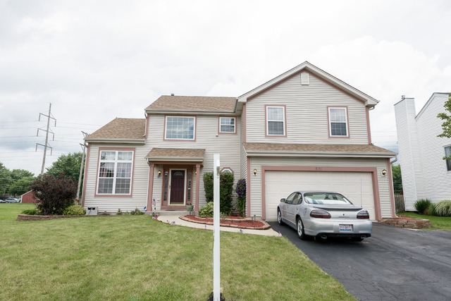 Property Photo:  631 Charolotte Lane  IL 60543 