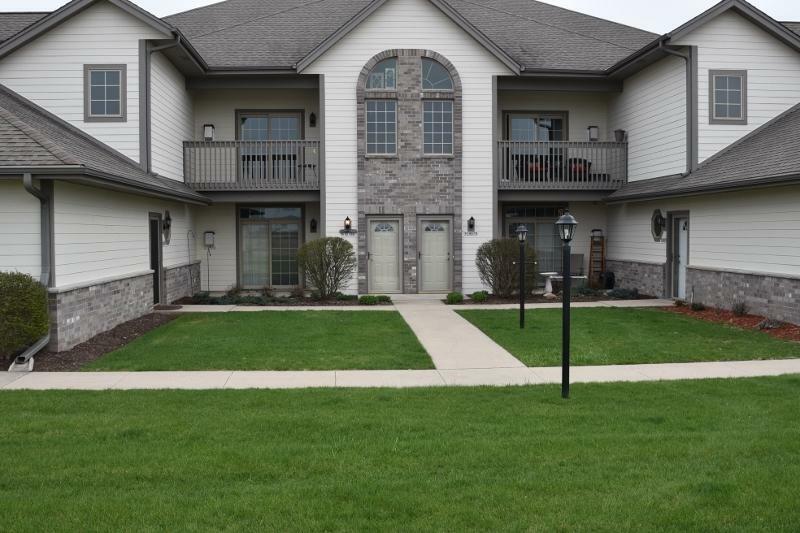 Property Photo:  W190n16186 Andrea Way 344  WI 53037 