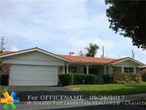 Property Photo:  5990 NE 22nd Way  FL 33308 