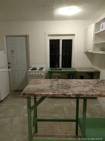 Property Photo:  1049 NW 95th St 2  FL 33150 