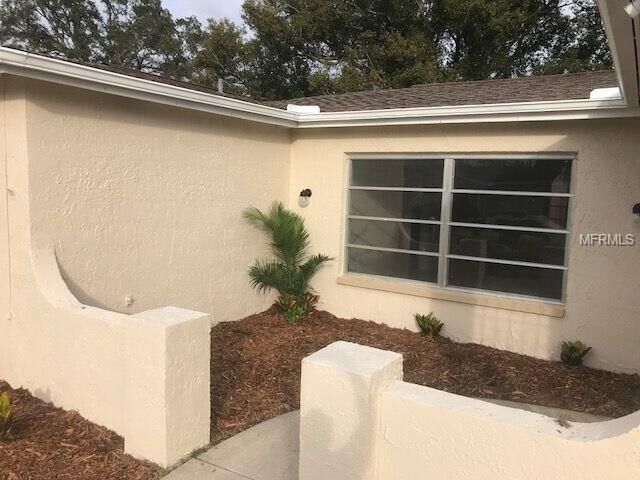Property Photo: 9034 Richwood Lane FL 34668
