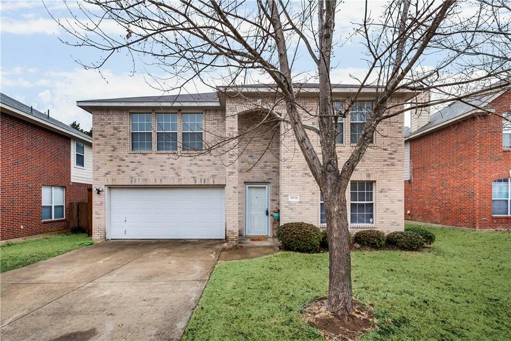 Property Photo: 1711 Cedarbrook Drive TX 75181