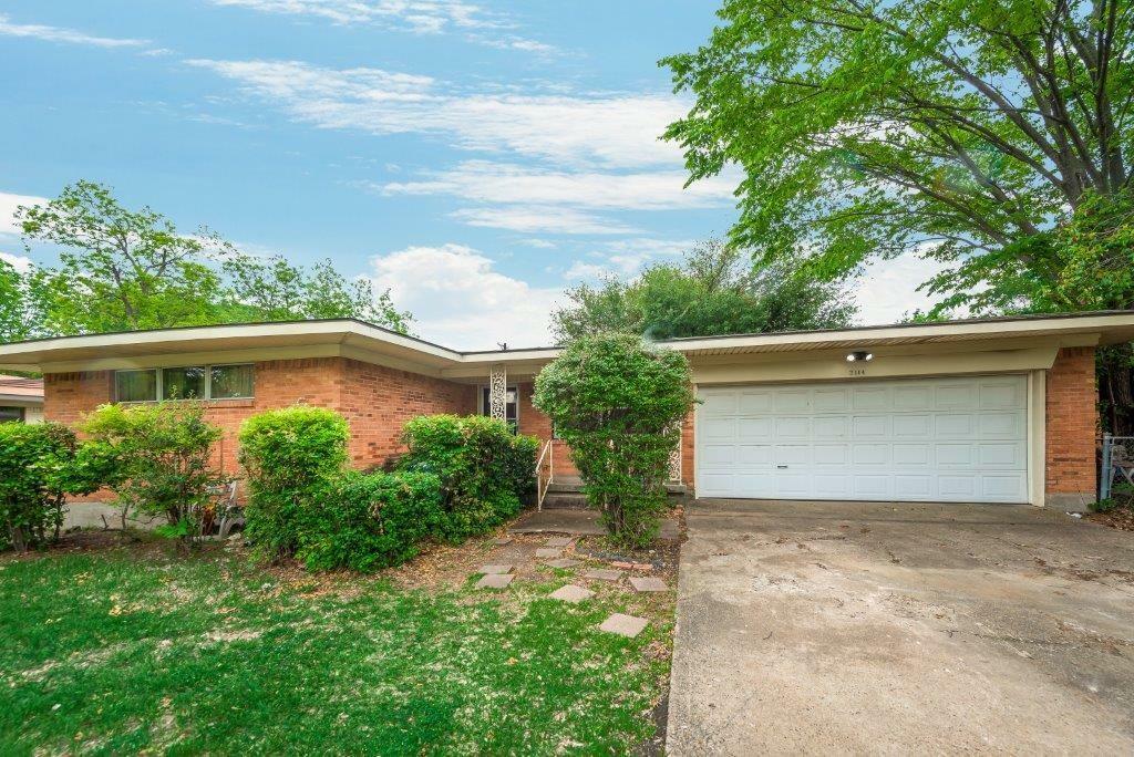 Property Photo: 2114 Mockingbird Lane TX 75042