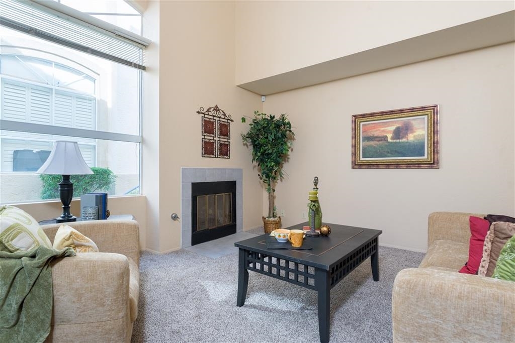 Property Photo: 6131 Calle Mariselda 106 CA 92124