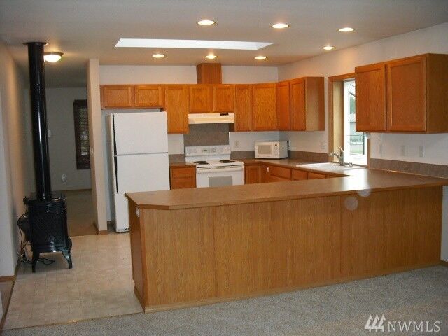 Property Photo: 8704 Pepperidge Lane SE WA 98597