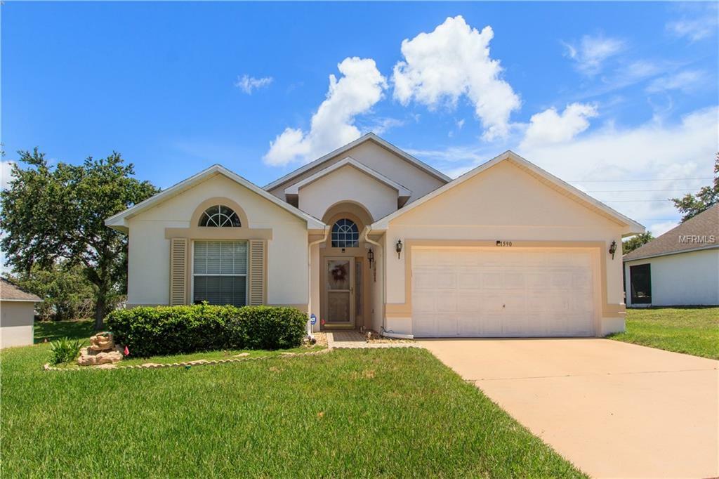 Property Photo:  1590 Silhouette Drive  FL 34711 