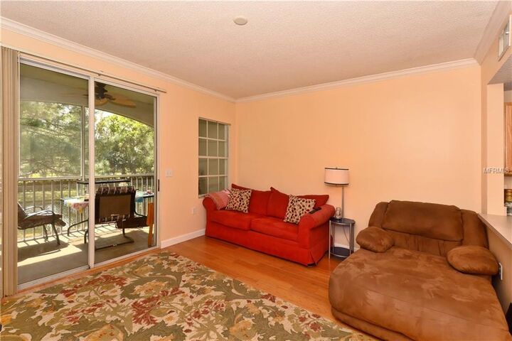 Property Photo:  4751 Travini Circle 4-114  FL 34235 