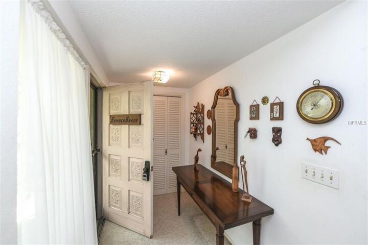 Property Photo:  134 Whispering Sands Circle V-13  FL 34242 