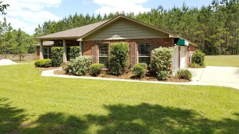Property Photo:  6571 Welannee Boulevard  FL 32567 