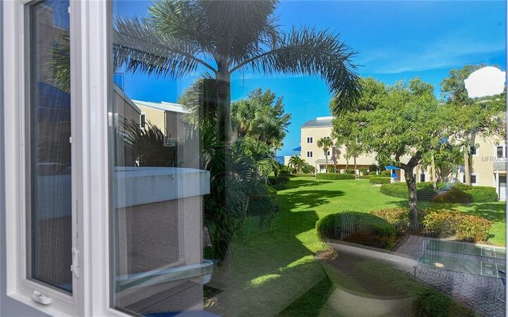 Property Photo:  4725 Gulf Of Mexico Drive 212  FL 34228 