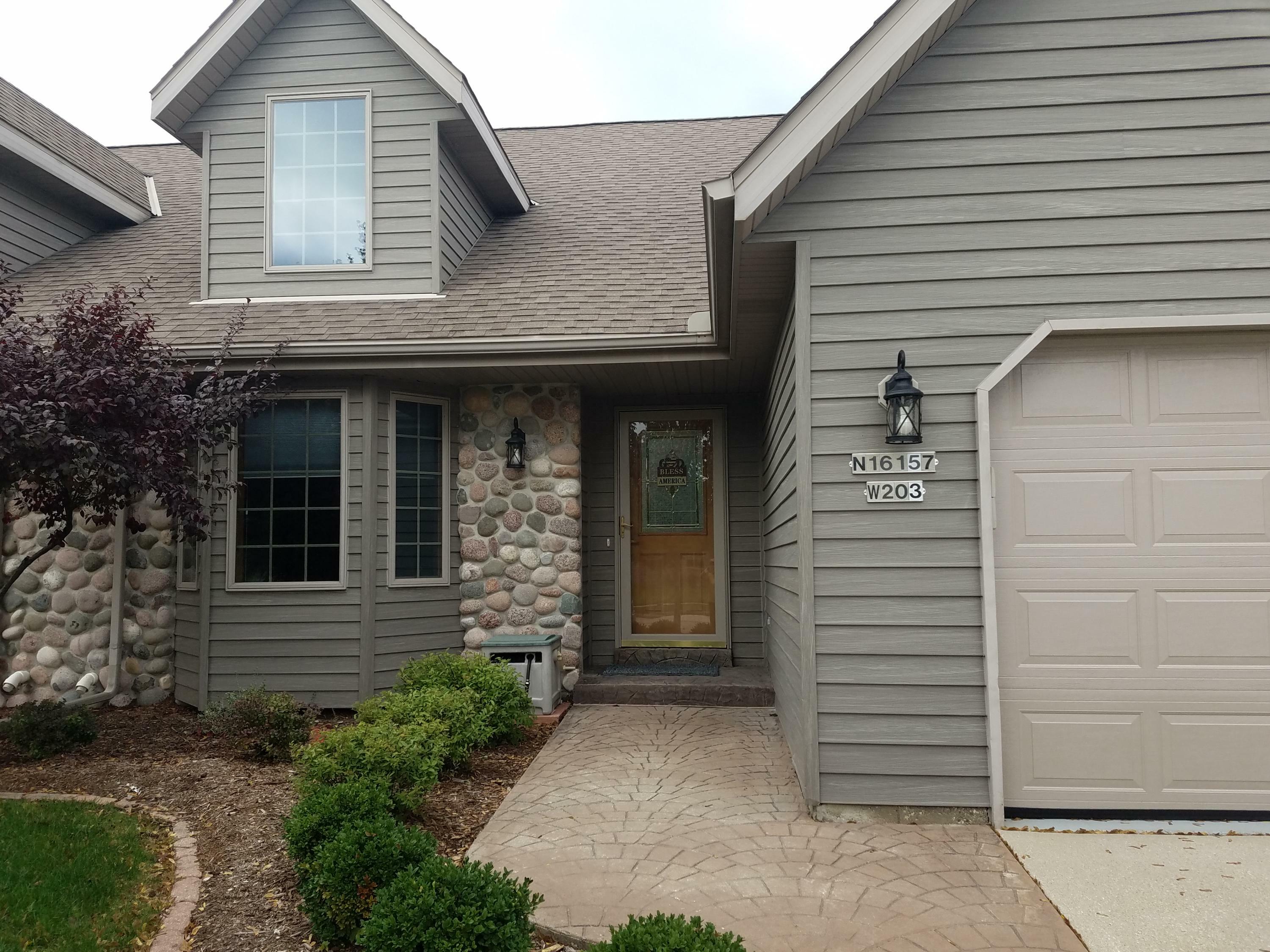 Property Photo:  W203n16157 Pin Oak Cir  WI 53037 