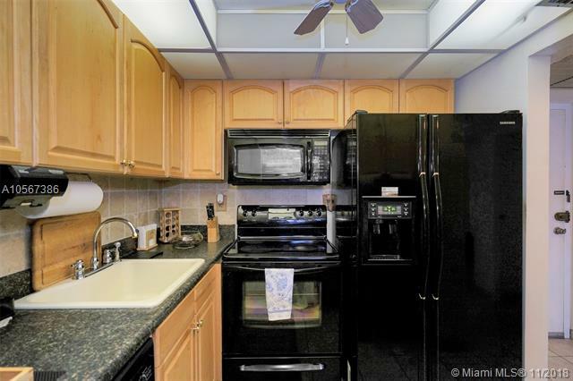 Property Photo:  210 172nd St 233  FL 33160 