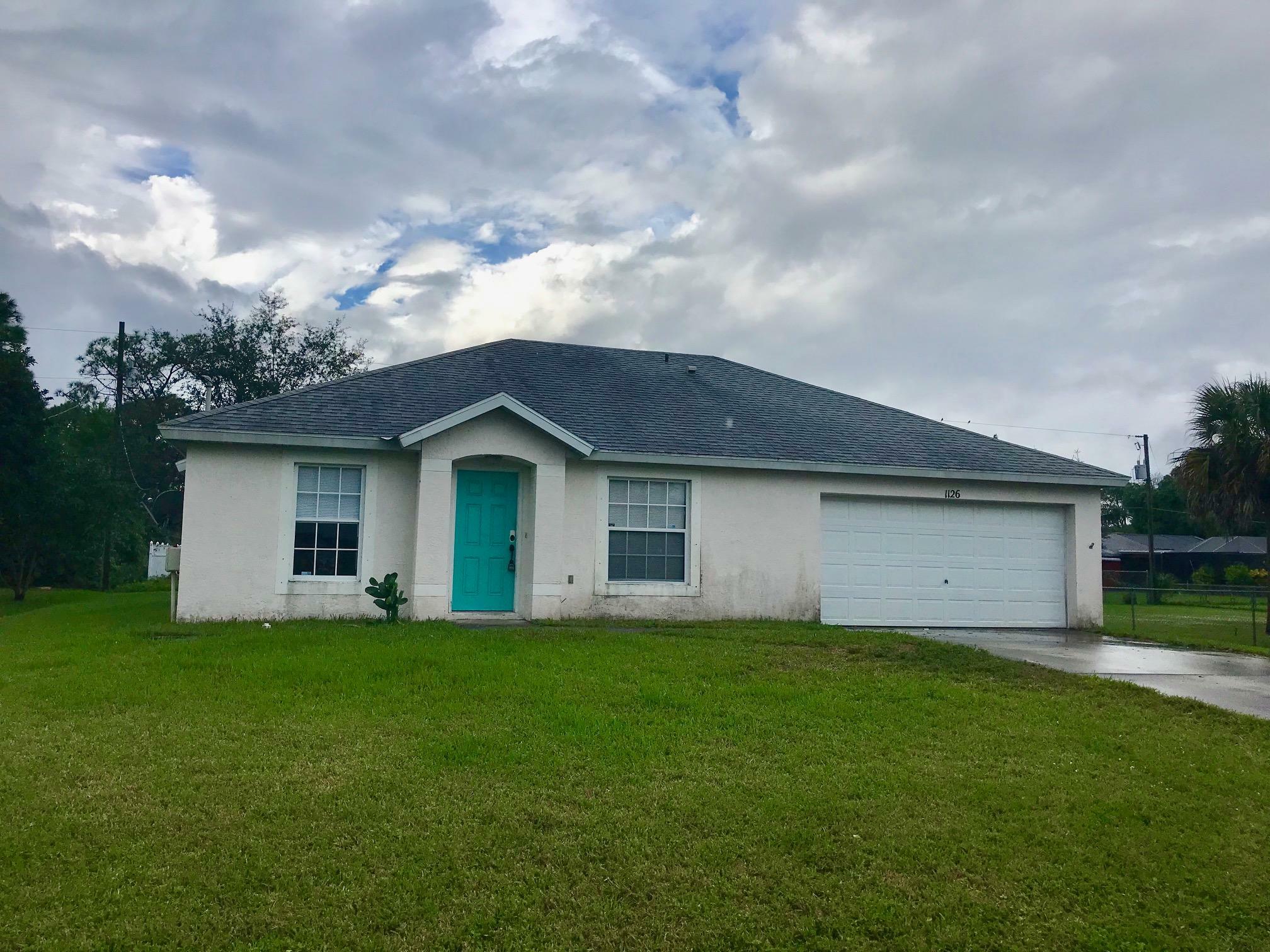 Property Photo:  1126 SW Hutchins Street  FL 34983 