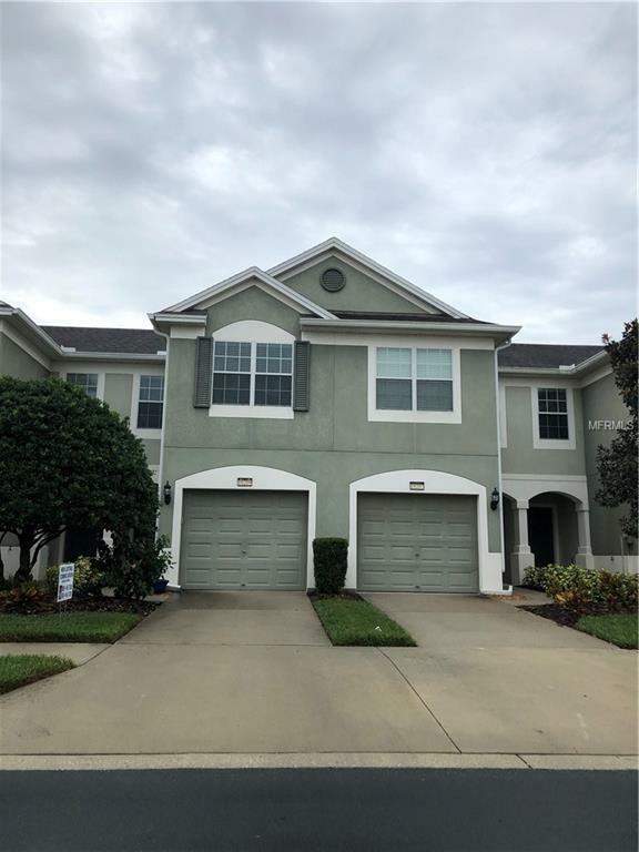 Property Photo: 10209 Red Currant Court FL 33578