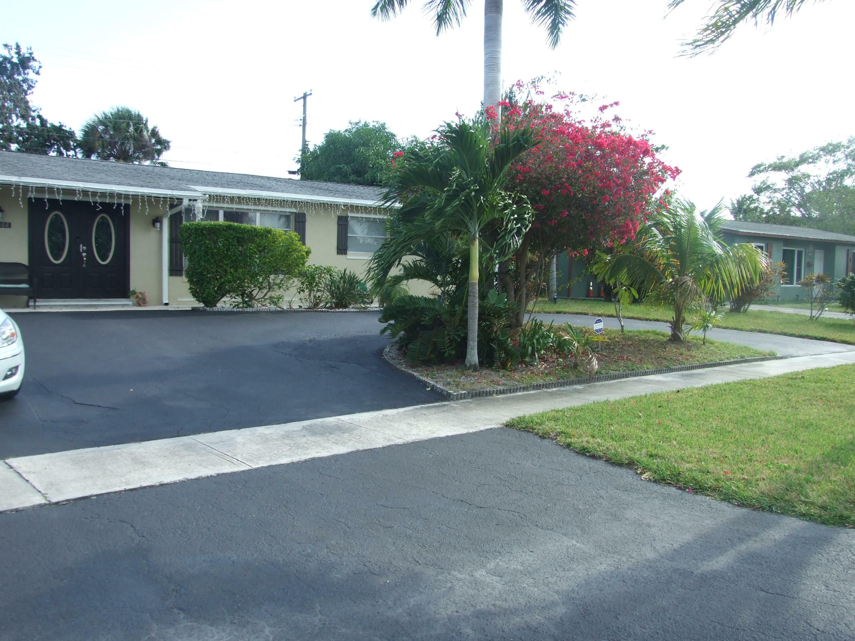 Property Photo:  12208 Hillman Drive  FL 33410 