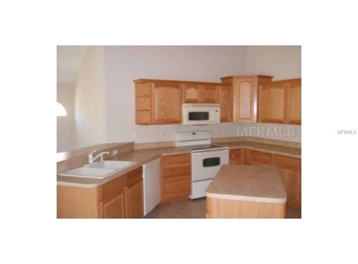 Property Photo:  11719 Regal Ridge Lane  FL 34711 
