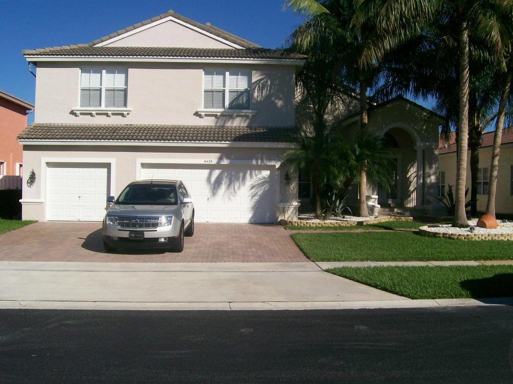 Property Photo: 6428 Shadow Creek Village Circle FL 33463