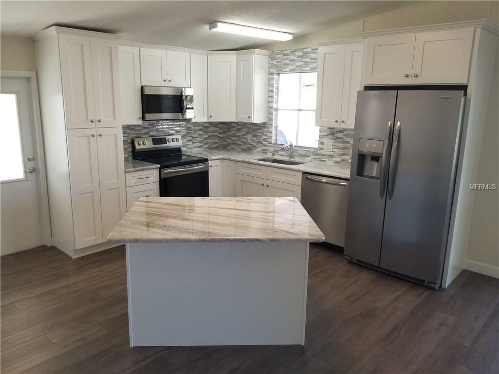 Property Photo: 279 Pelican Drive N FL 34677