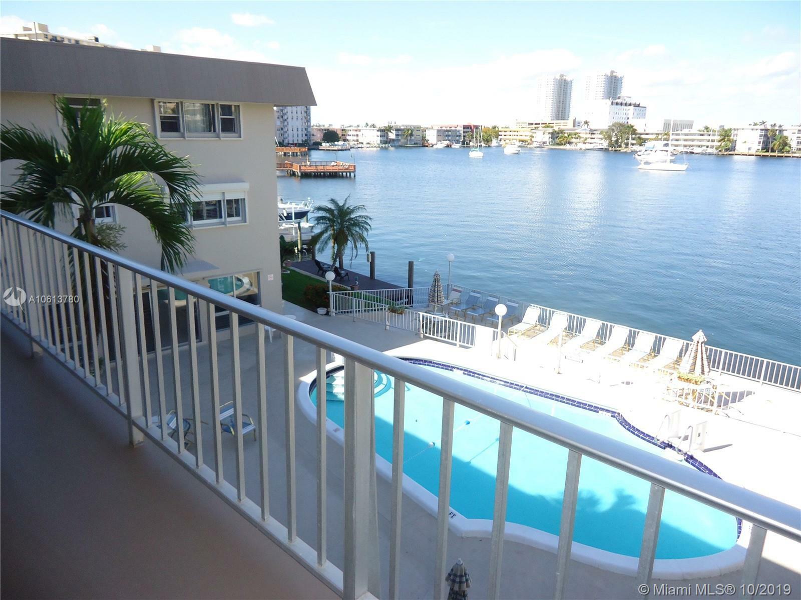 Property Photo:  300 Golden Isles Dr 320  FL 33009 